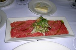 The Peninsula Grill, a fine dining restaurant in Charleston, offers a menu of contemporary American fare and Lowcountry seafood favorites.  This is their Beef Carpaccio