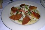The Peninsula Grill, this is the chef's own favorite dish: Jumbo Lump Crab Spinach and Tomato Salad with Fried Green Tomatoes